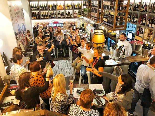 Making_a_toast_corporate_event_colorful_wines