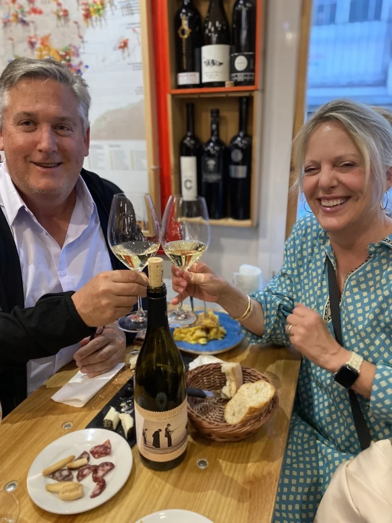 couple tapas great activity in Madrid with colorful wines